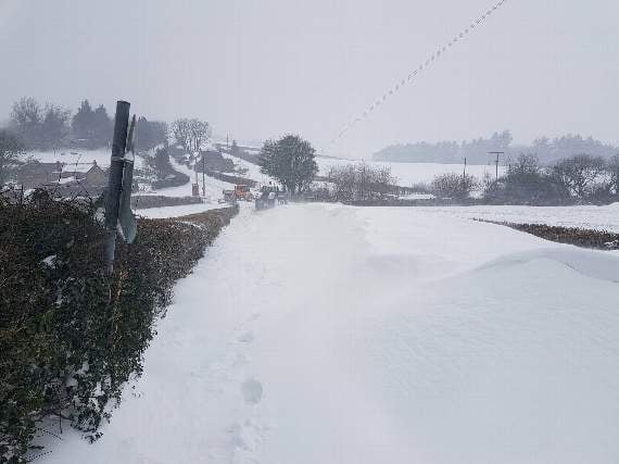 Some roads still impassable as teams work round the clock to dig out villages