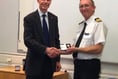 Commander George recognised for 'exemplary' 40 years as coastguard