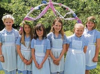 Maypole dancers put spring in fair's step