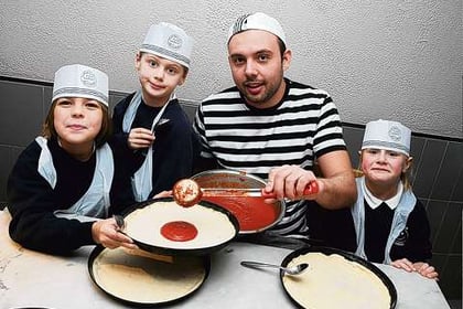Hungry pupils get a pizza the action