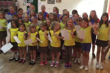 Brownies, Guides sing to save sport