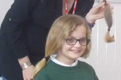 Caring Maddison lops her long locks for charity