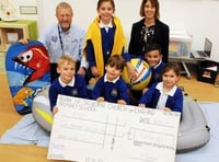 Pupils buoyant after RNLI cheque handover