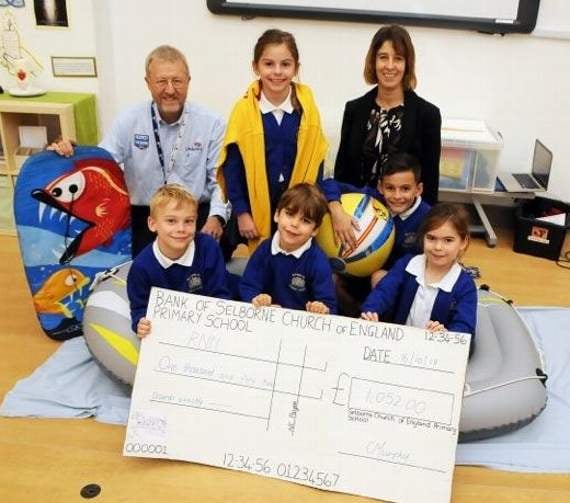 Pupils buoyant after RNLI cheque handover