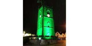 Clock tower goes green for recycling campaign