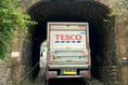 Trains cancelled after Tesco lorry hits rail bridge