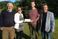 Community choir donates £1,000 to Save the Children