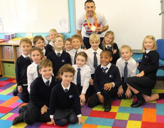 Paralympic triathlon champion inspires primary school children