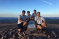 Rugby club members tackle the country’s highest peaks