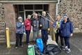 Hardy litter-pickers brave rain