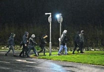 “We need freedom...not prison” chant asylum seekers on protest walk from camp to Tenby