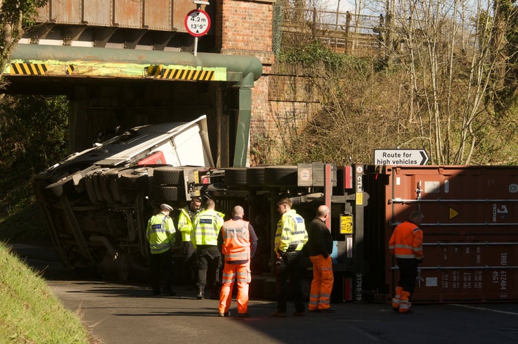 The lorry hit Wrecclesham railway bridge just before 10am on Thursday (March 17)