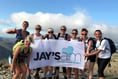 Mission accomplished — eight friends complete the Three Peaks Challenge raising thousands for Jay's AIM