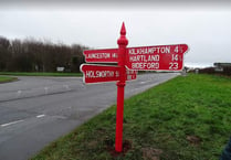 Red Post signpost back in place