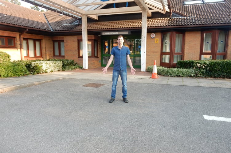 Cllr Andy Tree outside Chase Community Hospital in Bordon