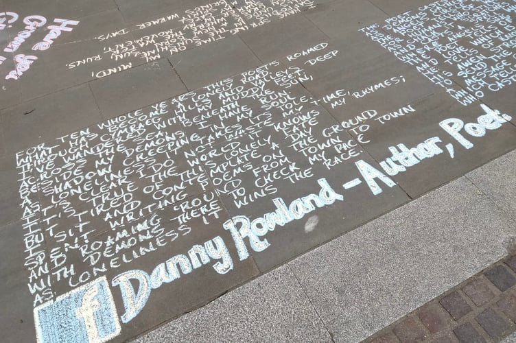 The full poem was on full display for all to see in the town centre until the evening shower washed it away last Wednesday.