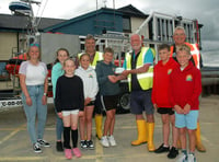 Pupils present £2,000 to lifeboat station