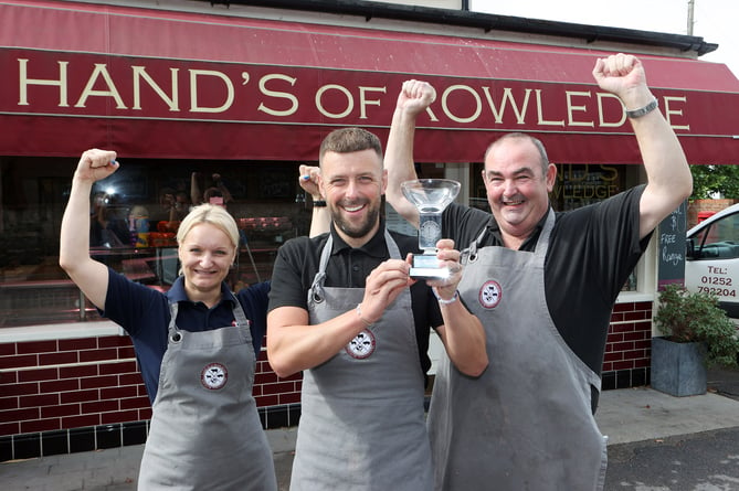 Hand’s of Rowledge celebrate their Best British Banger victory at the Farnham Lions Cider and Sausage Festival