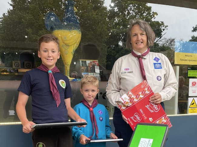 Fernhurst Group Scout leader Sue Gibbon with Beaver Jack Penfold and Scout Stuart Bradley