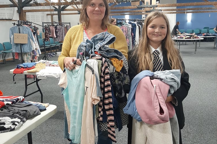 Young Alton Climate Action Network’s Back To The Rack 2 clothes thrift shop at Alton Maltings Centre, September 23rd 2022. 