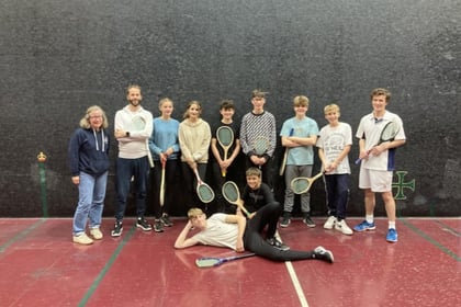 Haslemere Scouts try real tennis at Petworth House