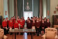 Three Dartmoor primary schools serenade Castle Drogo visitors