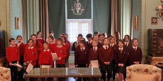 Three Dartmoor primary schools serenade Castle Drogo visitors