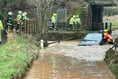 Firefighters rescued person from car in flood near Crediton
