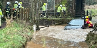 Firefighters rescued person from car in flood near Crediton
