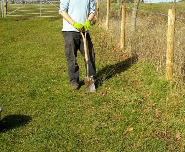 Alton Climate Action Network's project manager Scott Goldie digging at the Greenfields site