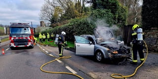 Pictures of car severely damaged in fire on A38 this morning