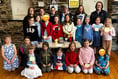 Tavistock Guides and Brownies light candles for Coronation