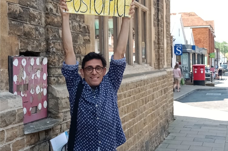 Save Haslemere post office petitioner Anil Sharma outside the West Street branch