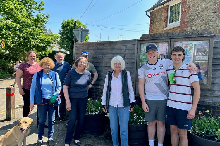 The Bourne Crossroads have been ‘beautified’ once again thanks to the efforts of a committed band of villagers