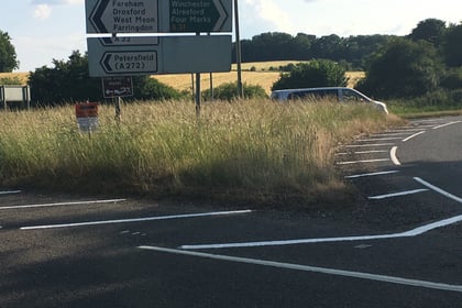 Chawton A31 roundabout grass finally cut by Hampshire County Council