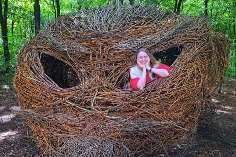 Storyteller Dawn Nelson at the Giant’s Head sculpture in Queen Elizabeth Country Park, July 2023.