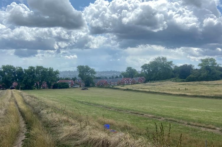 The site of Gleeson Homes' proposed 83-home extension to the Abbey View development in Crondall Lane, Farnham, is currently open countryside, criss-crossed by footpaths