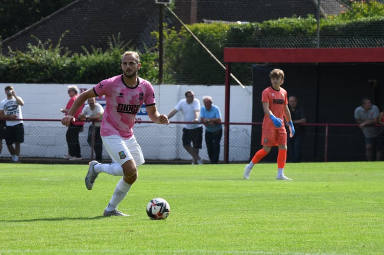 Tom Smith on the ball at Flackwell Heath