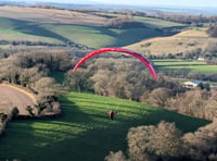 Sky Surfing Club members fly from Butser Hill near Petersfield