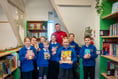 Exeter City FC Captain opens newly renovated school library
