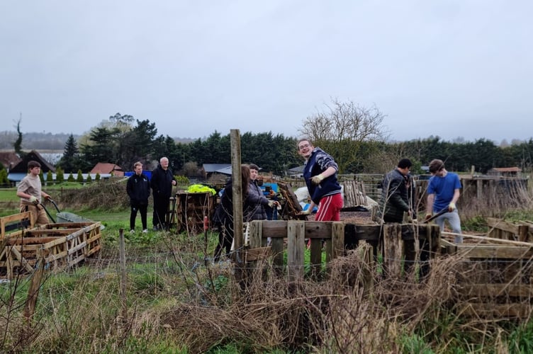 Children and staff from The Abbey School helping out at Farnham Community Farm