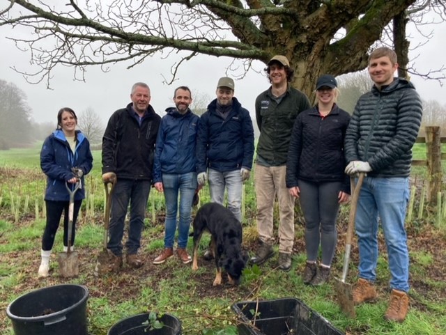 Staff from Motion, a Guildford-based transport and travel planning consultancy, with Farnham Park ranger Nick MacFarlane