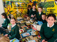 School donates incredible 2,318 books to Children’s Book Project