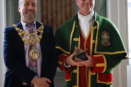 Town crier makes the podium twice at first competition 
