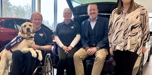 Dealership welcomes driving force behind East Hampshire canine charity