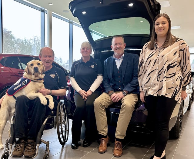 Dealership welcomes driving force behind East Hampshire canine charity