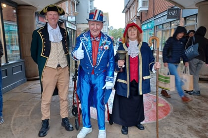Town crier's royal announcement to bank holiday shoppers