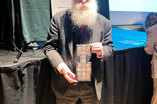 Irving Finkel, lecturer to The Arts Society Farnham, with the board for the game of Ur, May 21st 2024.