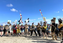 Campaigners mount beach protest against proposed desalination plant