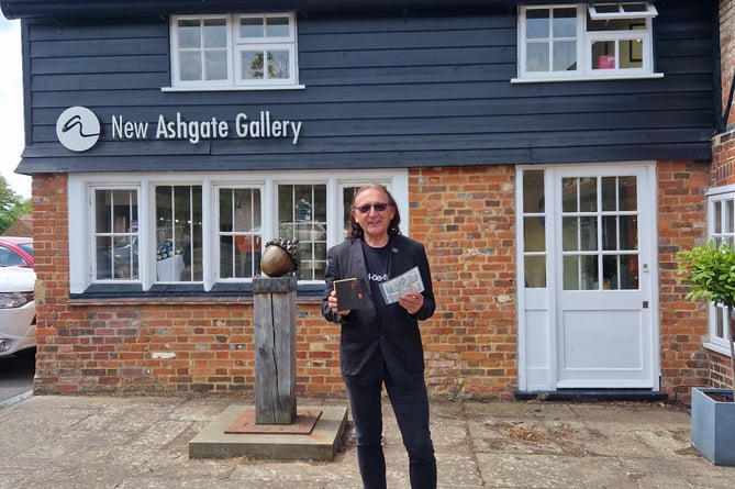 Professor David Dawson Ferry, president of the Royal Society of Painter-Printmakers, New Ashgate Gallery, Farnham, with John Bryce print, July 2024.